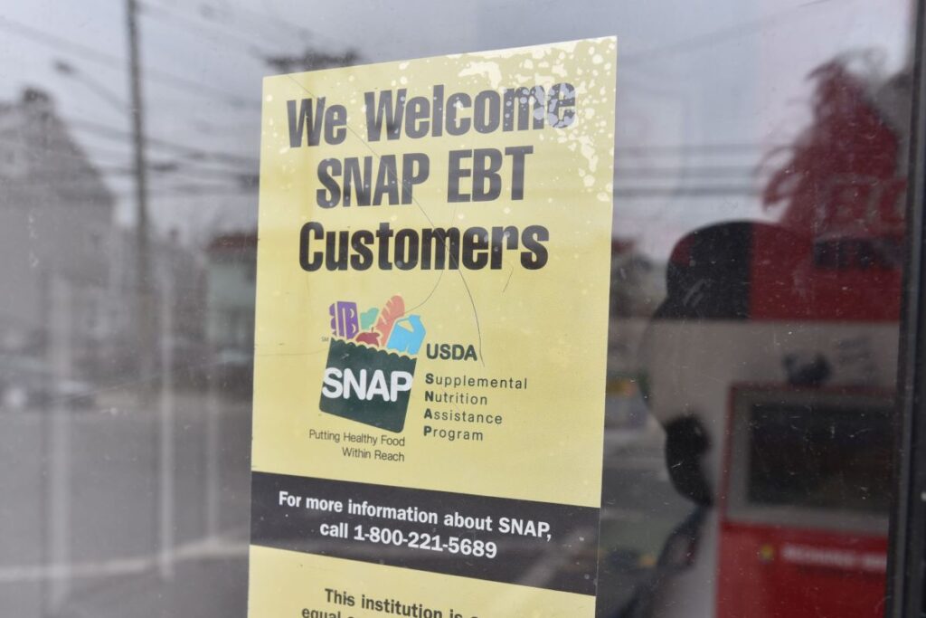 EBT Snap sticker at a deli supermarket entrance door. Photo by NRS
